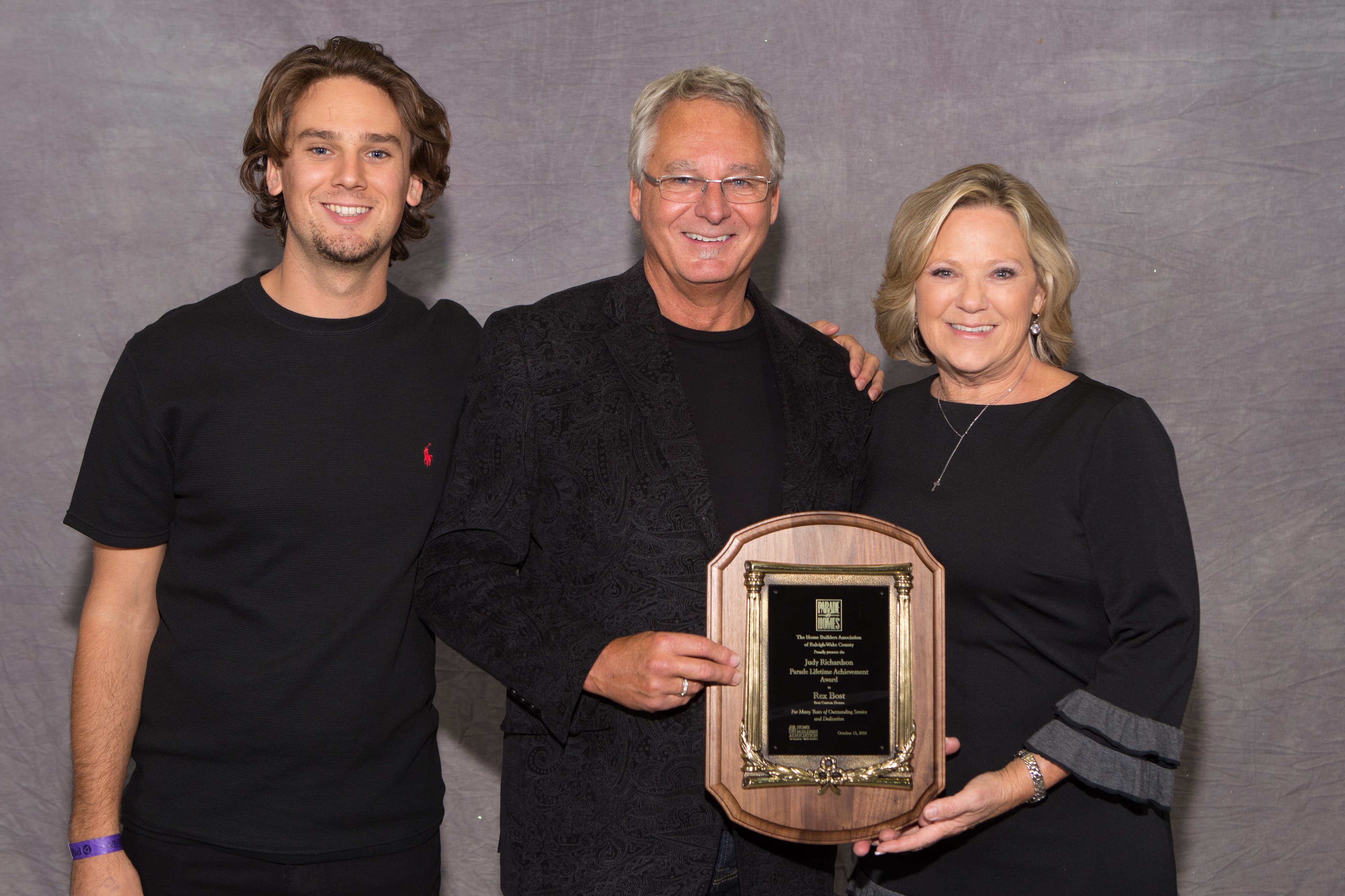 Rex Bost receiving the 2016 HBA Parade of Homes Lifetime Achievement Award